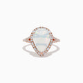 The Aurora 14K Rose Gold Pear Shaped Opal and Diamond Ring features a pear-shaped opal, a diamond halo, and diamond accents along the band, shown on a plain white background.