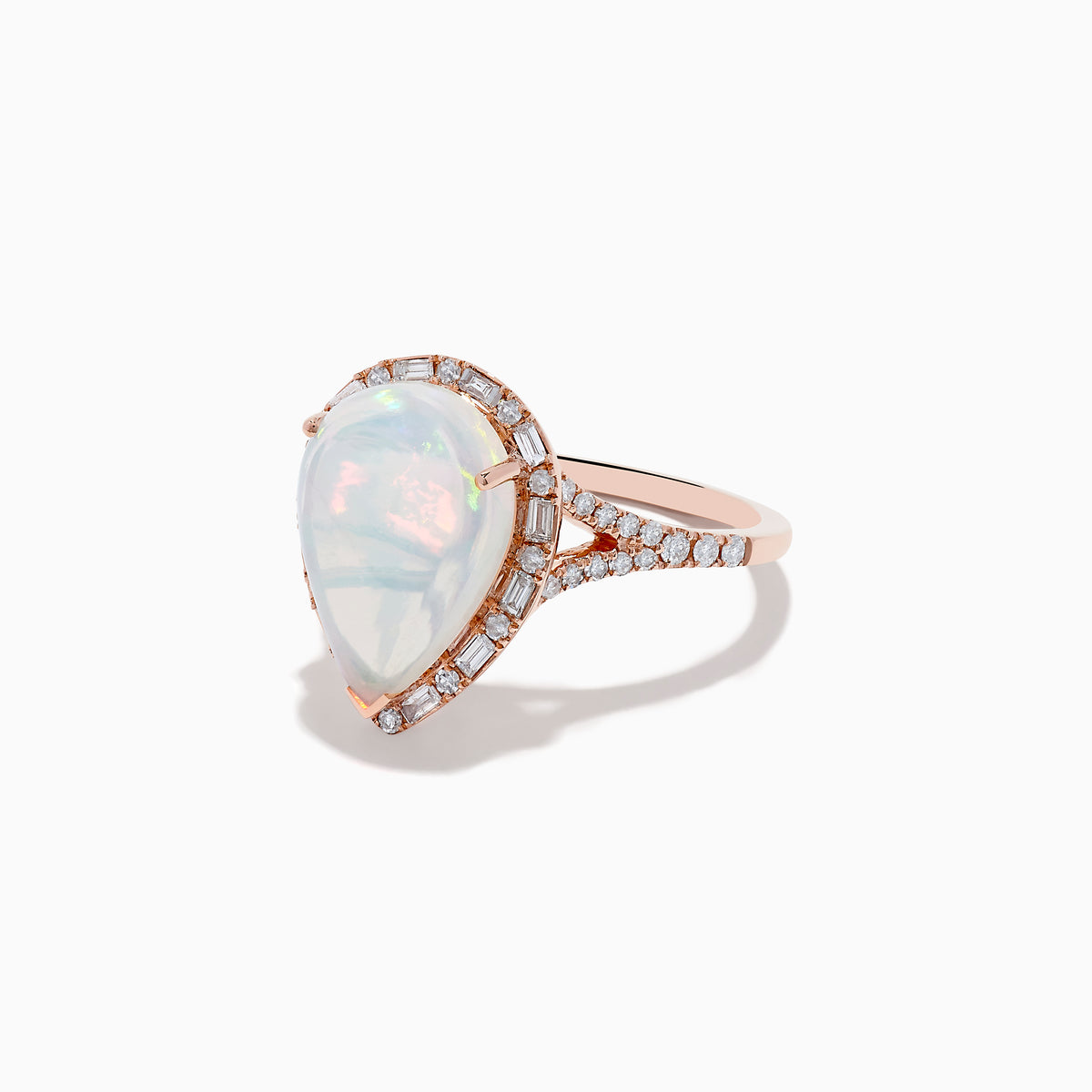 The Aurora 14K Rose Gold Pear Shaped Opal and Diamond Ring features a pear-shaped opal, a diamond halo, and diamond accents along the band, shown on a plain white background.