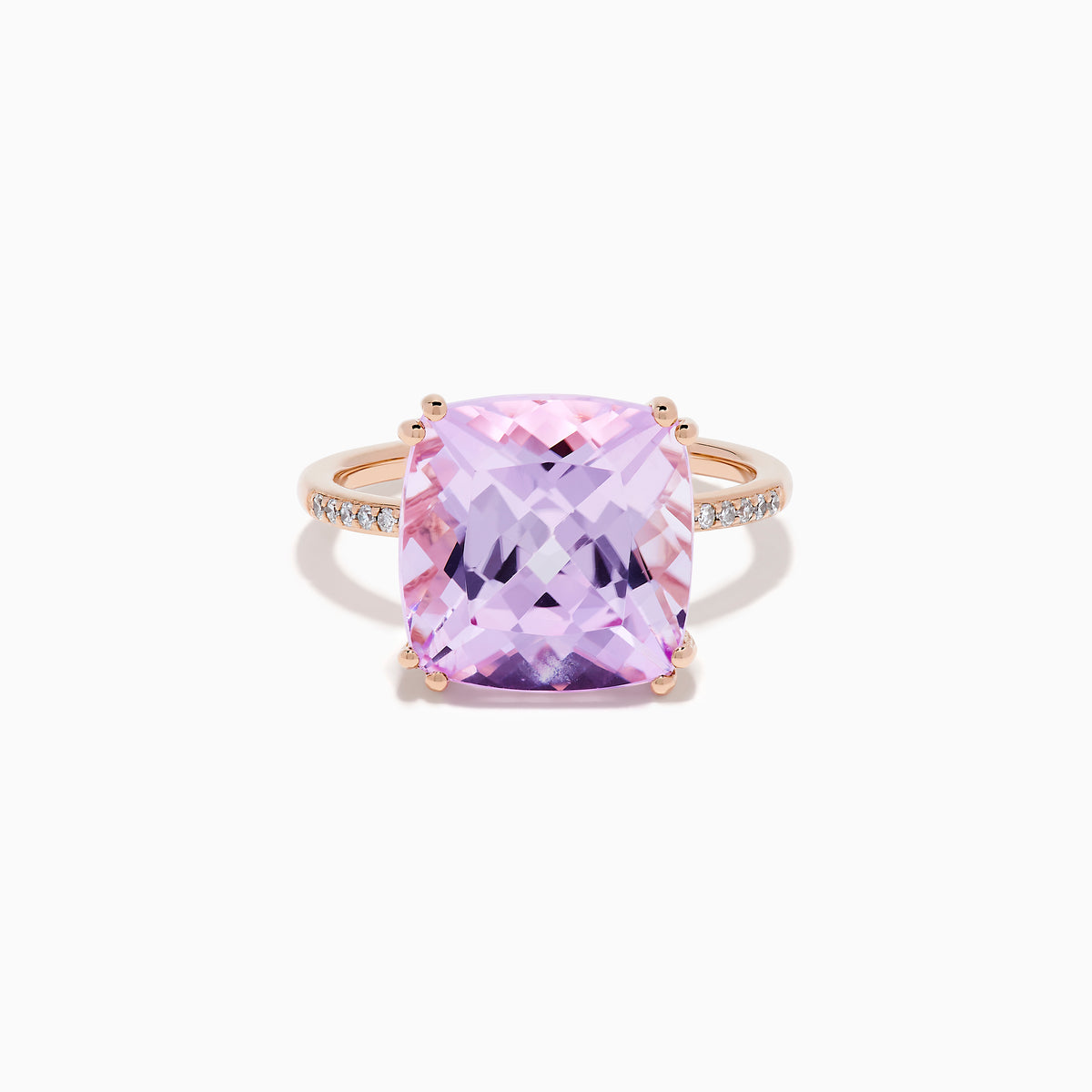 The 14K Rose Gold Kunzite and Diamond Ring features a striking cushion-cut kunzite gemstone at the center, accented with sparkling diamonds along the band.