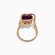 The 14K Rose Gold Amethyst and Diamond Heart Ring features a large heart-shaped amethyst set in rose gold, accented by a diamond-encrusted band, shown on a white background.