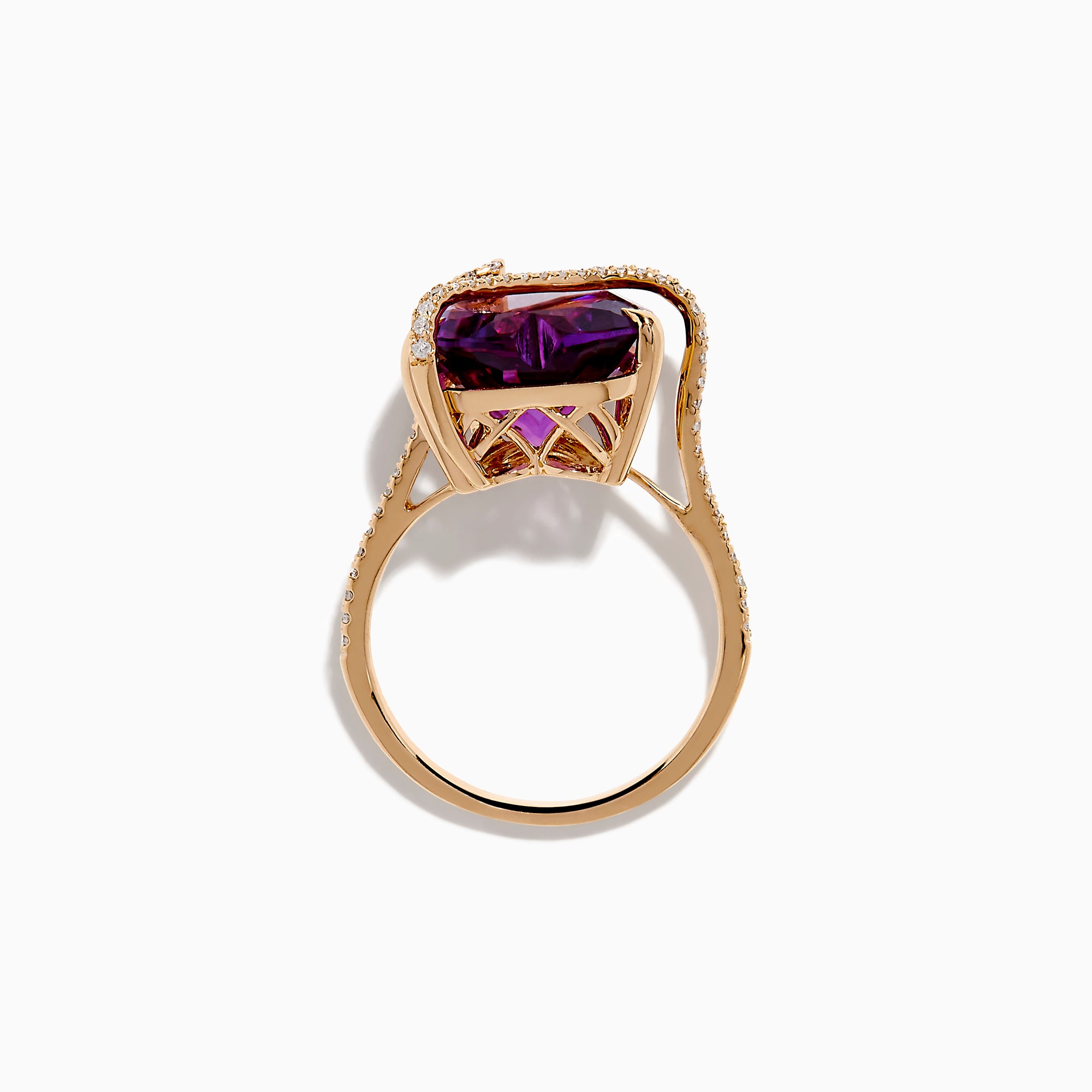 The 14K Rose Gold Amethyst and Diamond Heart Ring features a large heart-shaped amethyst set in rose gold, accented by a diamond-encrusted band, shown on a white background.