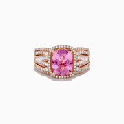 The 14K Rose Gold Kunzite and Diamond Ring showcases a cushion-cut kunzite center stone, accented by multiple rows of sparkling diamonds on the band.
