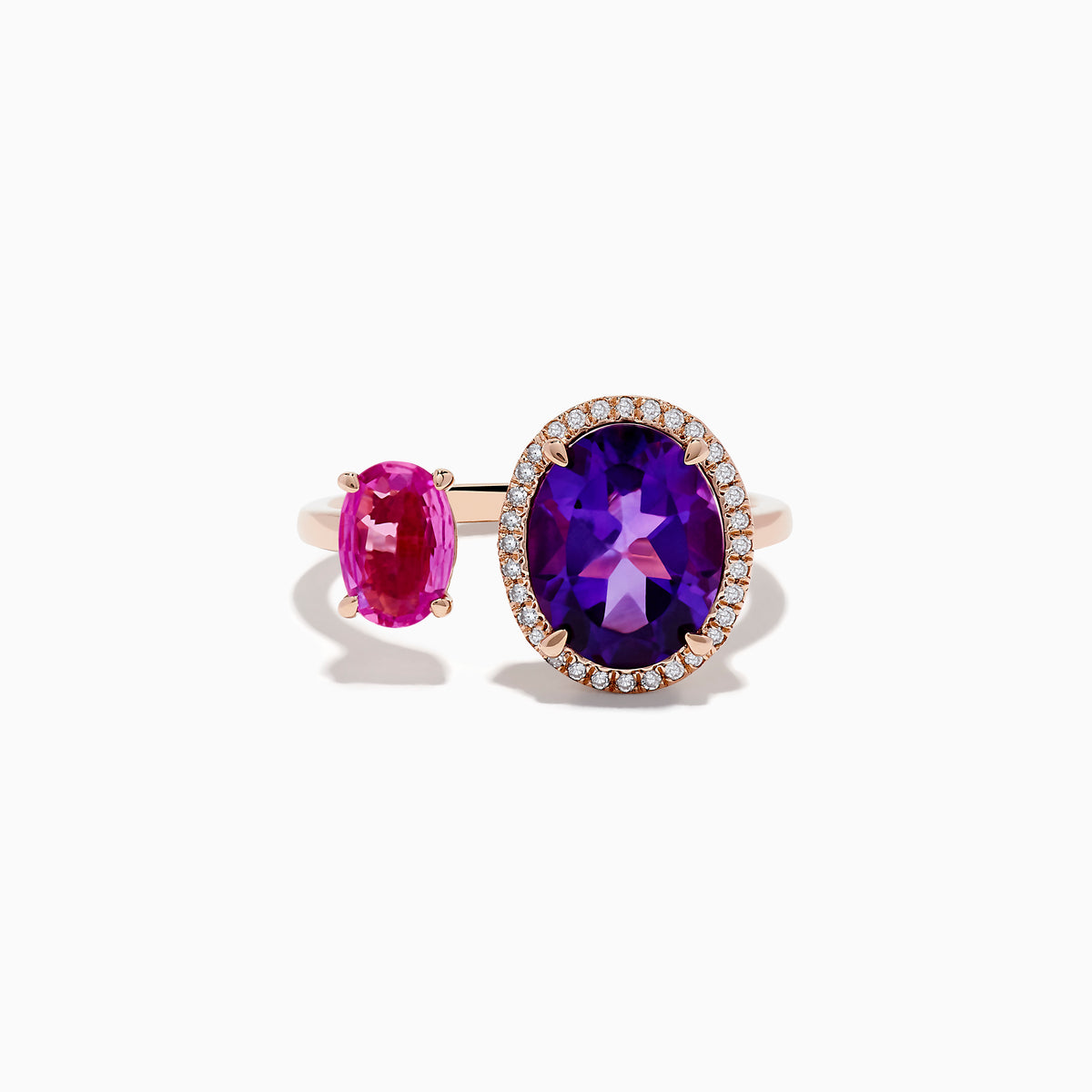 The 14K Rose Gold Amethyst, Pink Sapphire, and Diamond Toi Et Moi Ring features a large oval amethyst with diamond accents and a smaller oval pink sapphire set on a delicate band.