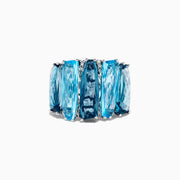A striking 14K White Gold Blue Topaz and Diamond Statement Ring featuring seven large rectangular blue topaz stones arranged vertically, accented with diamonds—an elegant and eye-catching design.