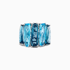 A striking 14K White Gold Blue Topaz and Diamond Statement Ring featuring seven large rectangular blue topaz stones arranged vertically, accented with diamonds—an elegant and eye-catching design.