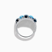 A striking 14K White Gold Blue Topaz and Diamond Statement Ring featuring seven large rectangular blue topaz stones arranged vertically, accented with diamonds—an elegant and eye-catching design.