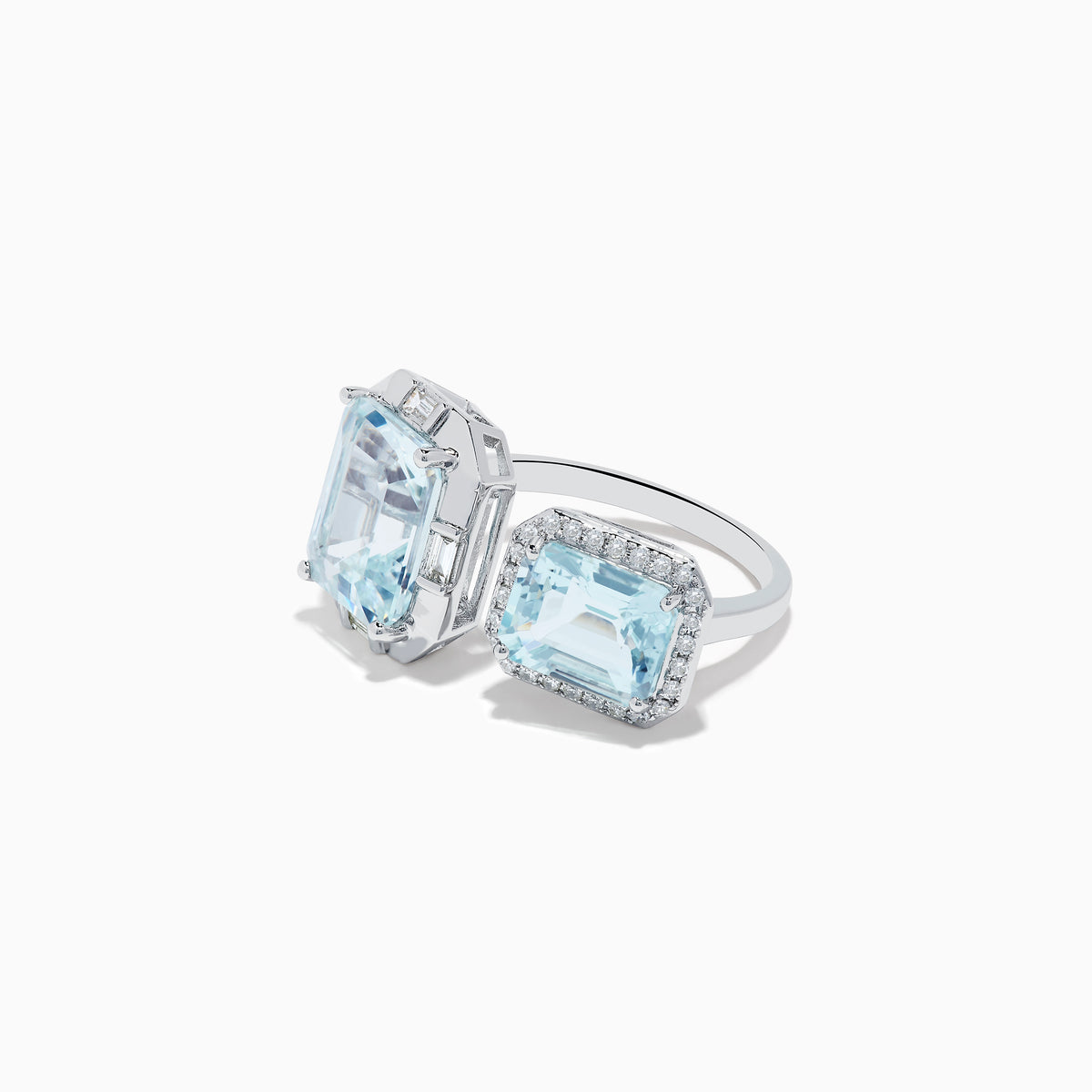 The 14K White Gold Double Aquamarine Ring features two light blue stones—one encircled by diamonds in a halo setting and the other set in a minimal geometric design.