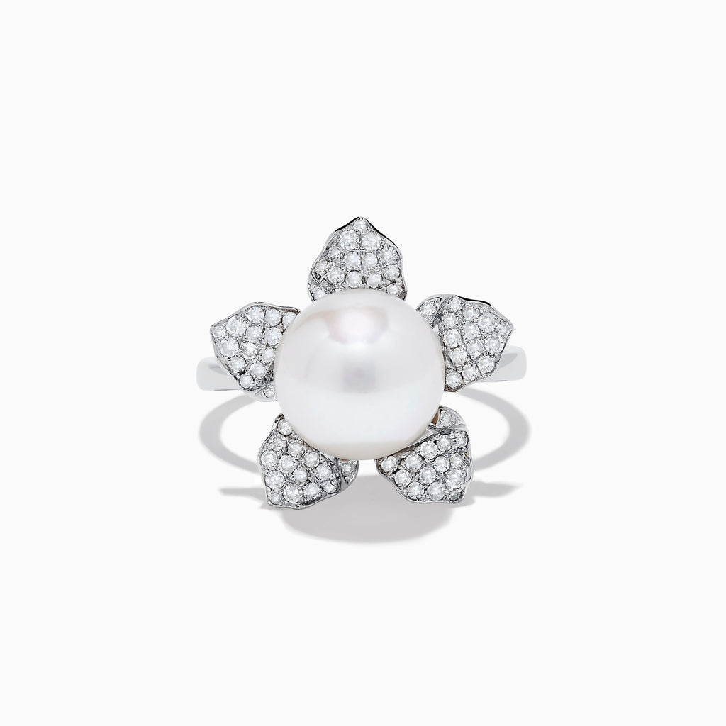 The 14K White Gold Fresh Water Pearl and Diamond Flower Ring features a large pearl at the center, surrounded by five diamond-accented petals on a sleek white gold band.