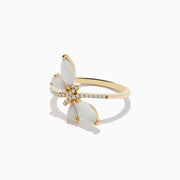 The Aurora 14K Yellow Gold Opal and Diamond Butterfly Ring features marquise white stones as wings, sparkling opal accents, and small round diamonds on the band, shown against a white background.