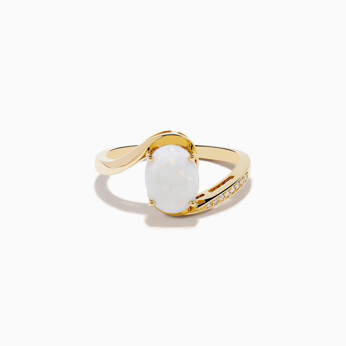 The Aurora 14K Yellow Gold Opal and Diamond Ring showcases an oval white opal center stone accented by small round diamonds on one side of the band, shown against a white background.