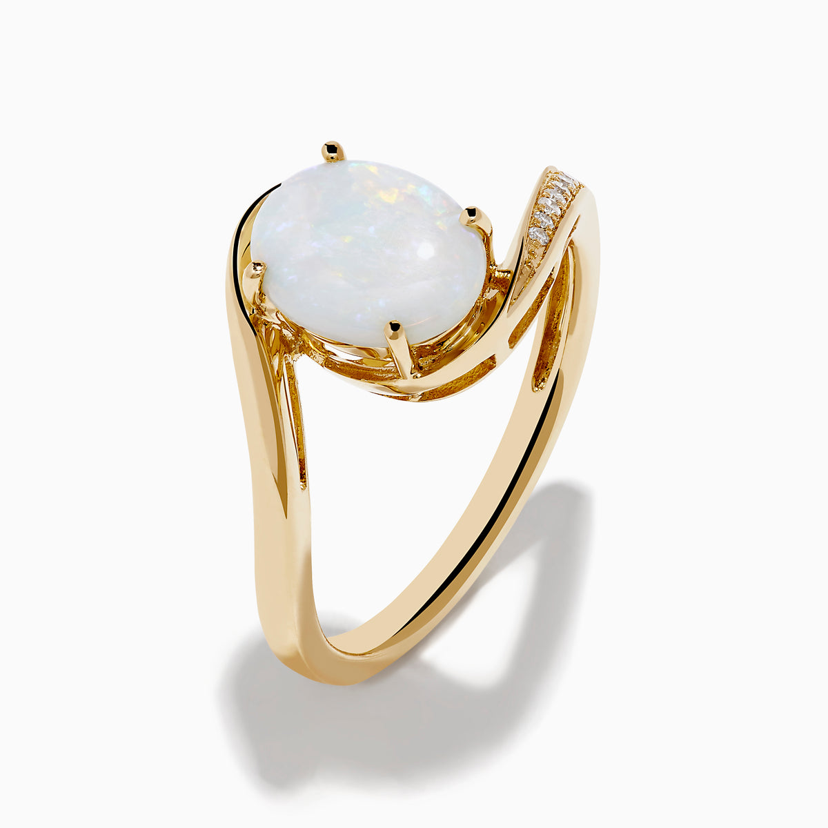 The Aurora 14K Yellow Gold Opal and Diamond Ring showcases an oval white opal center stone accented by small round diamonds on one side of the band, shown against a white background.