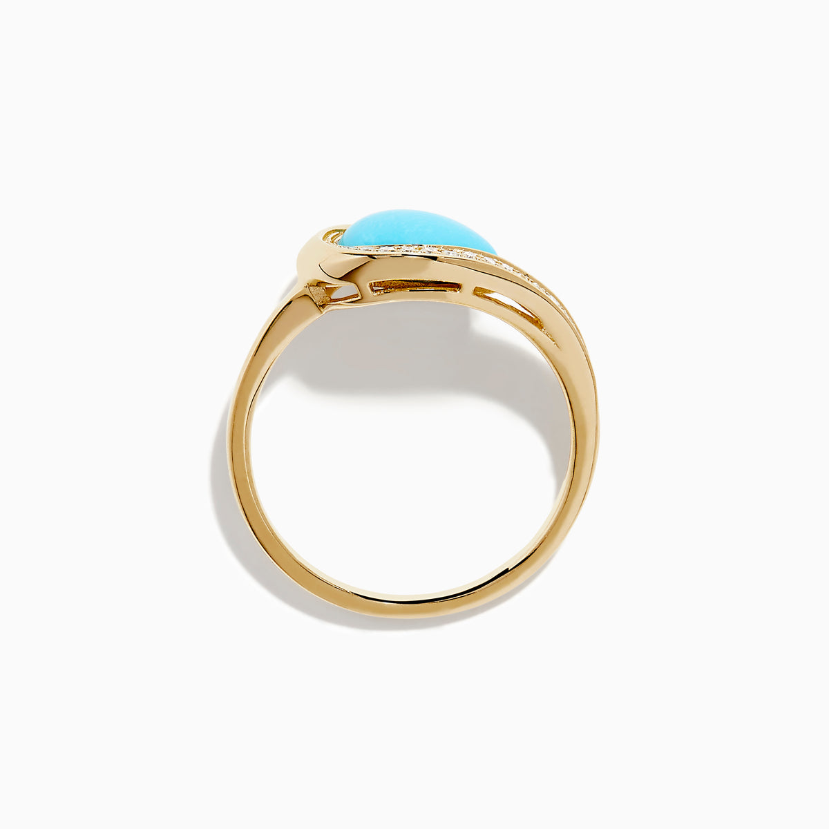 The Terra 14K Yellow Gold Turquoise and Diamond Ring showcases an asymmetrical turquoise stone and a curved band with small white diamonds, set against a white background.