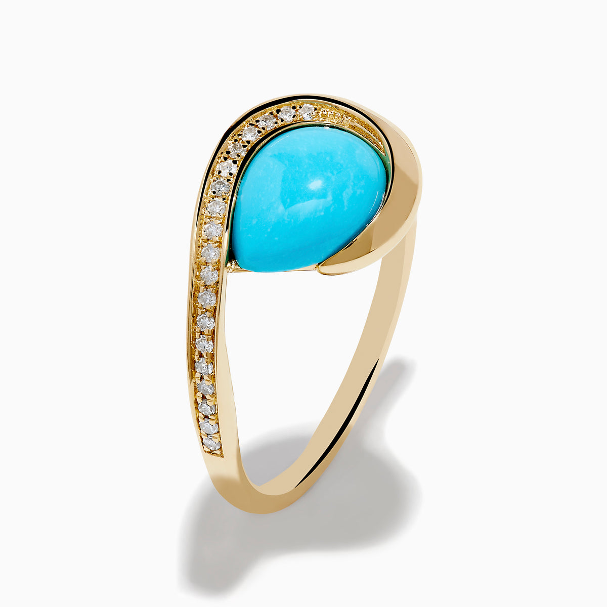 The Terra 14K Yellow Gold Turquoise and Diamond Ring showcases an asymmetrical turquoise stone and a curved band with small white diamonds, set against a white background.