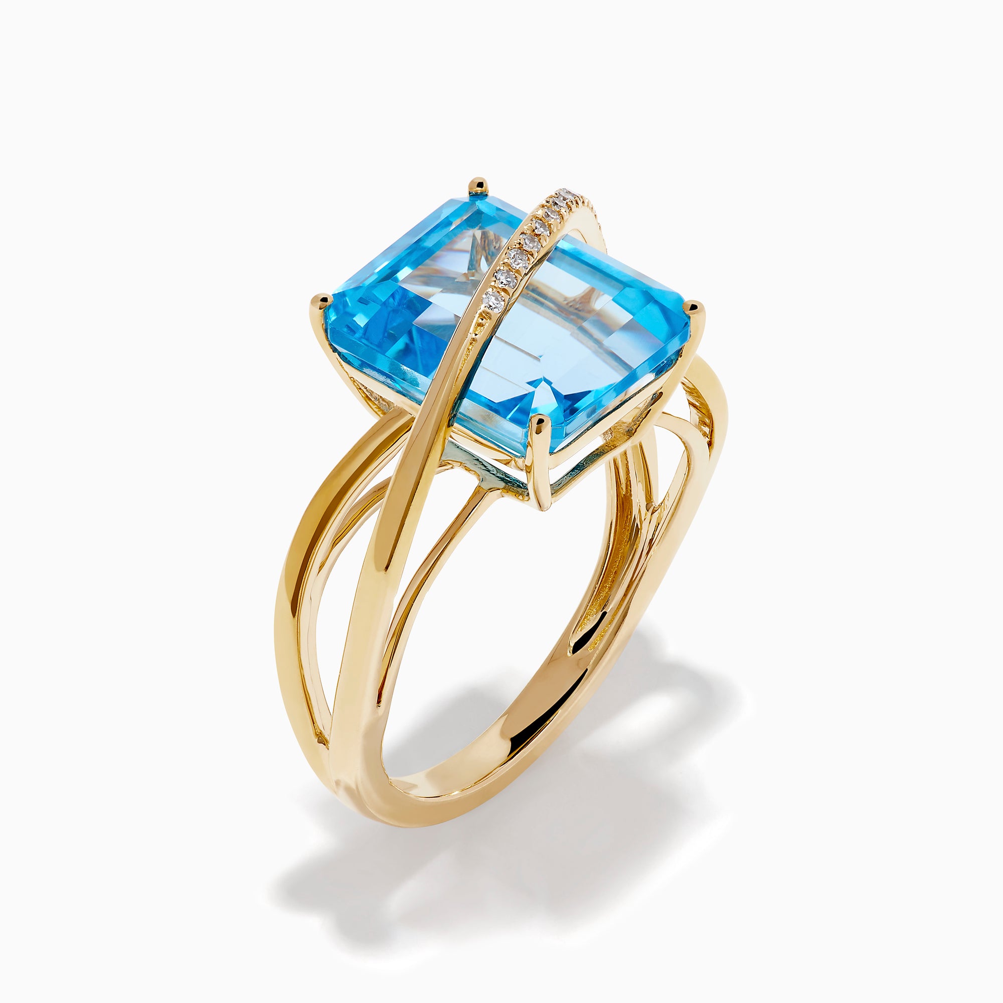 14K Yellow Gold Blue Topaz and Diamond Crossover Ring