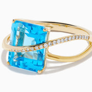 14K Yellow Gold Blue Topaz and Diamond Crossover Ring