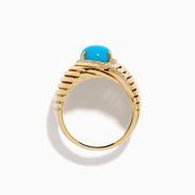 The 14K Yellow Gold Turquoise and Diamond Wide Band Ring features an oval turquoise center stone with a halo of small white diamonds and grooved lines, displayed against a plain white background.