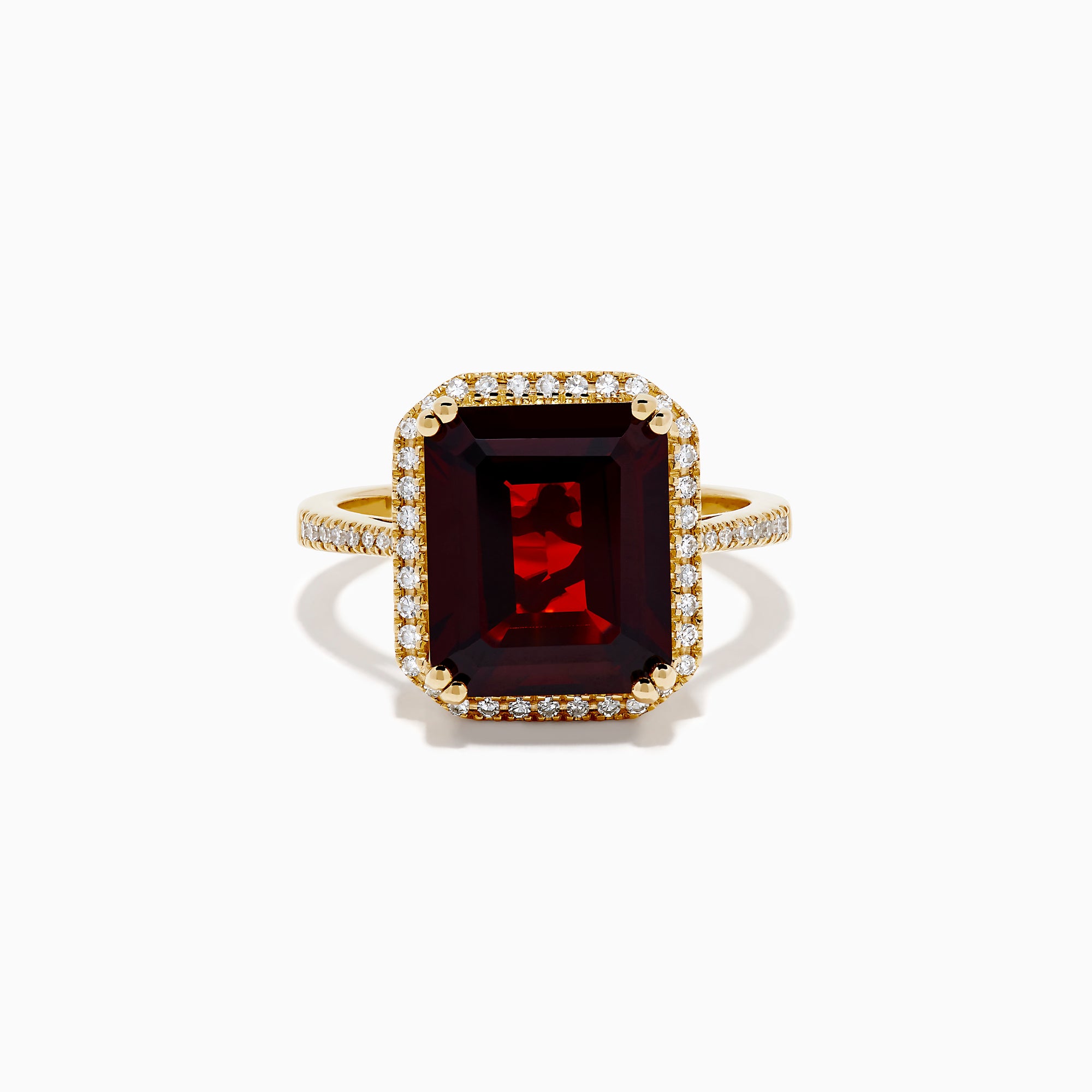 The 14K Yellow Gold Garnet and Diamond Halo Cocktail Ring showcases a large rectangular deep red garnet, surrounded by a diamond halo and diamonds on the band, set against a white background.