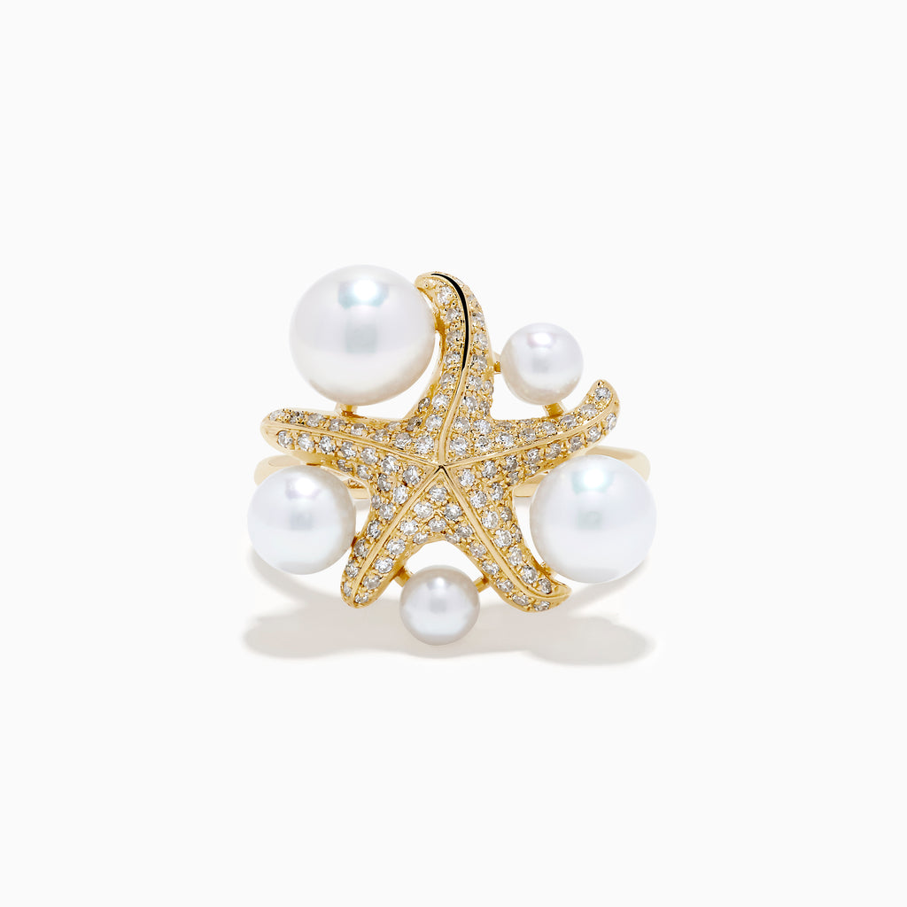 The 14K Yellow Gold Pearl and Diamond Starfish Ring showcases five large white pearls of varying sizes and a sparkling diamond starfish design.
