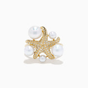 The 14K Yellow Gold Pearl and Diamond Starfish Ring showcases five large white pearls of varying sizes and a sparkling diamond starfish design.