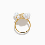 The 14K Yellow Gold Pearl and Diamond Starfish Ring showcases five large white pearls of varying sizes and a sparkling diamond starfish design.