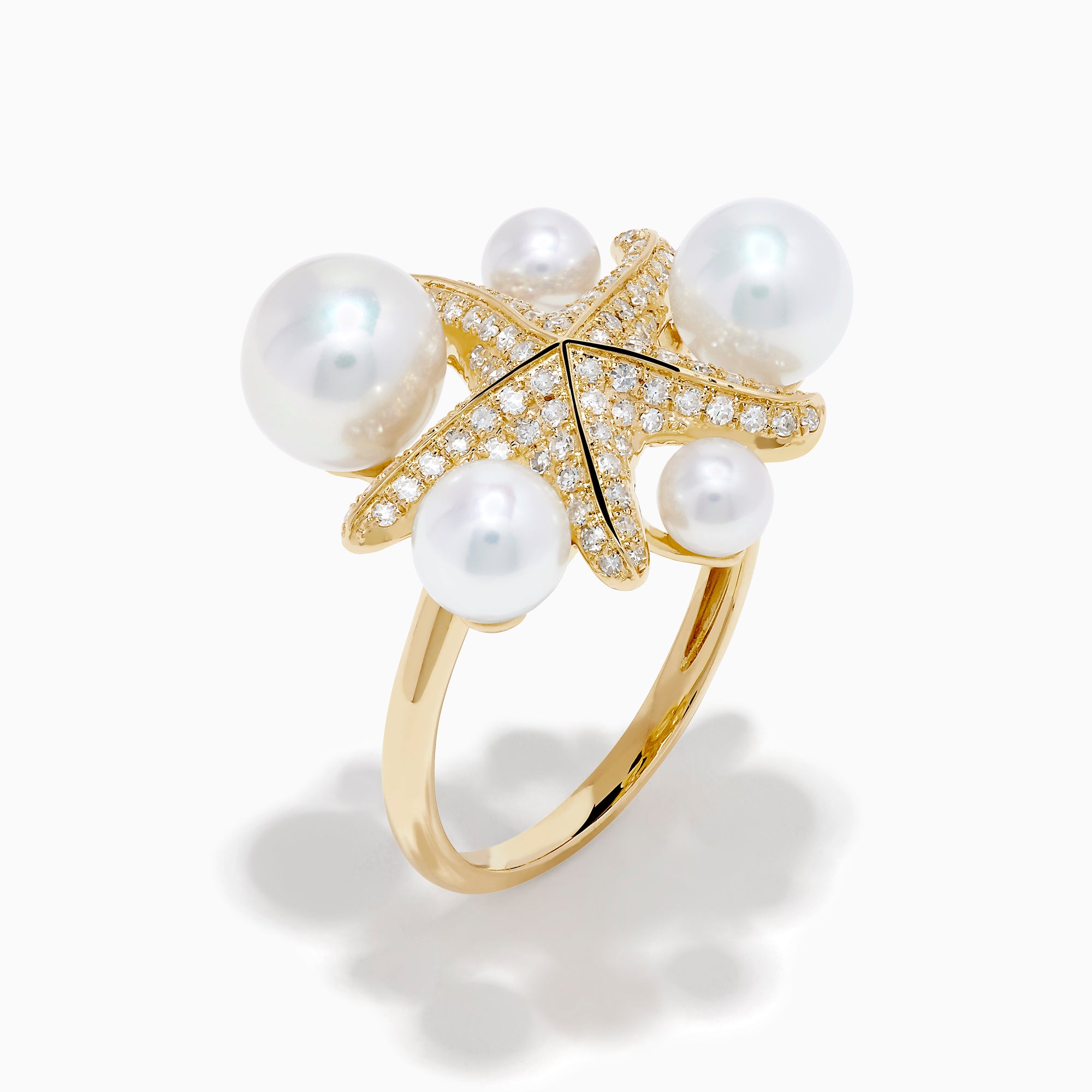 The 14K Yellow Gold Pearl and Diamond Starfish Ring showcases five large white pearls of varying sizes and a sparkling diamond starfish design.