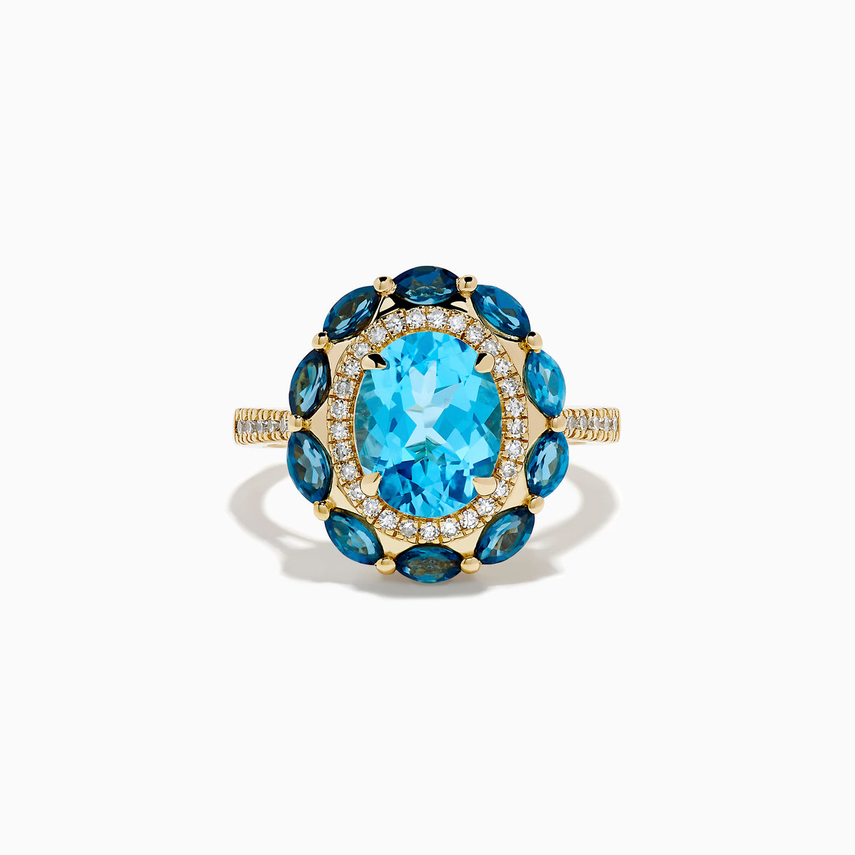 The Ocean Bleu 14K Yellow Gold Blue Topaz and Diamond Ring showcases a large oval blue topaz center, haloed by clear diamonds and marquise deep blue stones, all set on a textured yellow gold band.