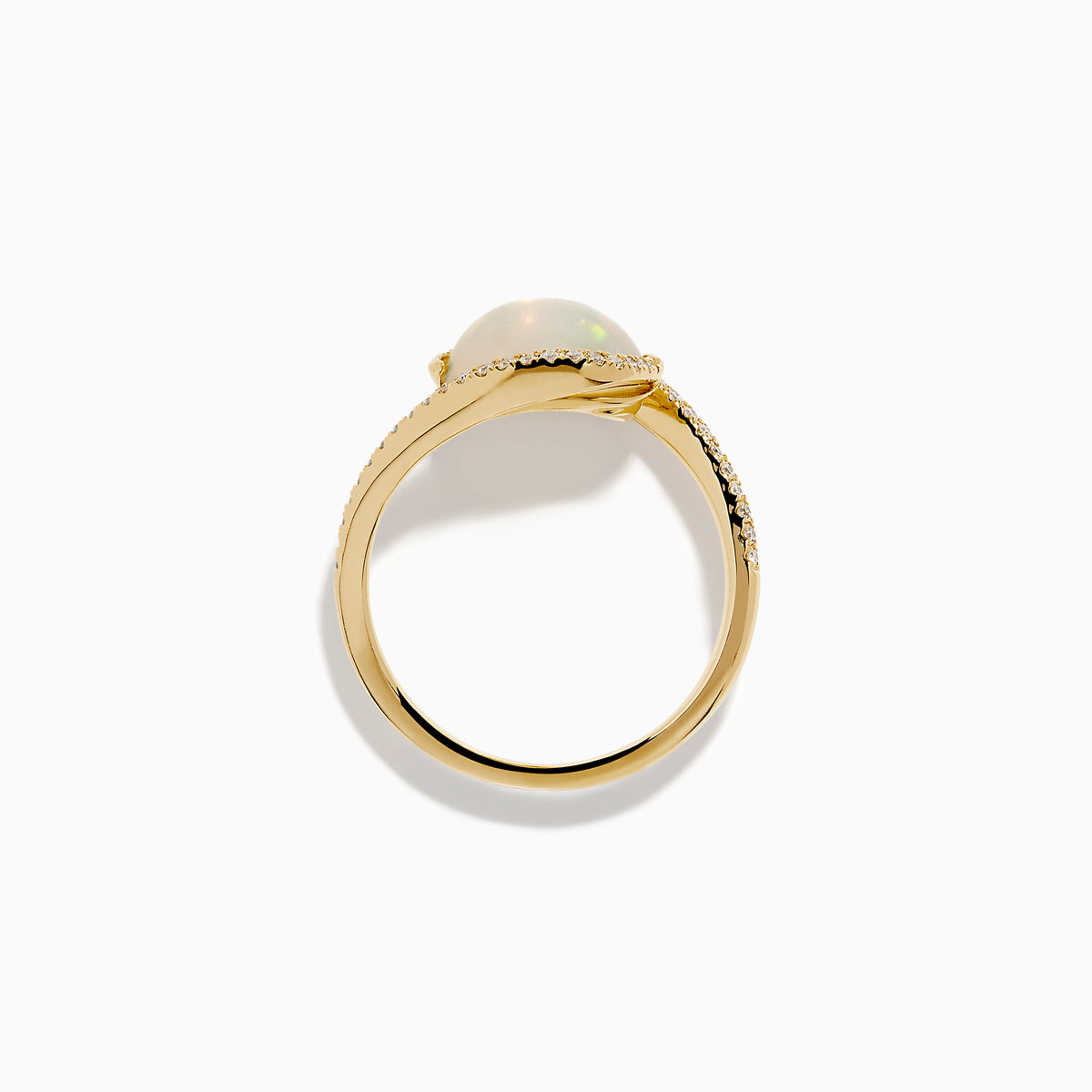The 14K Yellow Gold Ethiopian Opal and Diamond Swirl Ring showcases a striking Ethiopian opal set in yellow gold, complemented by a swirling band adorned with sparkling diamonds.