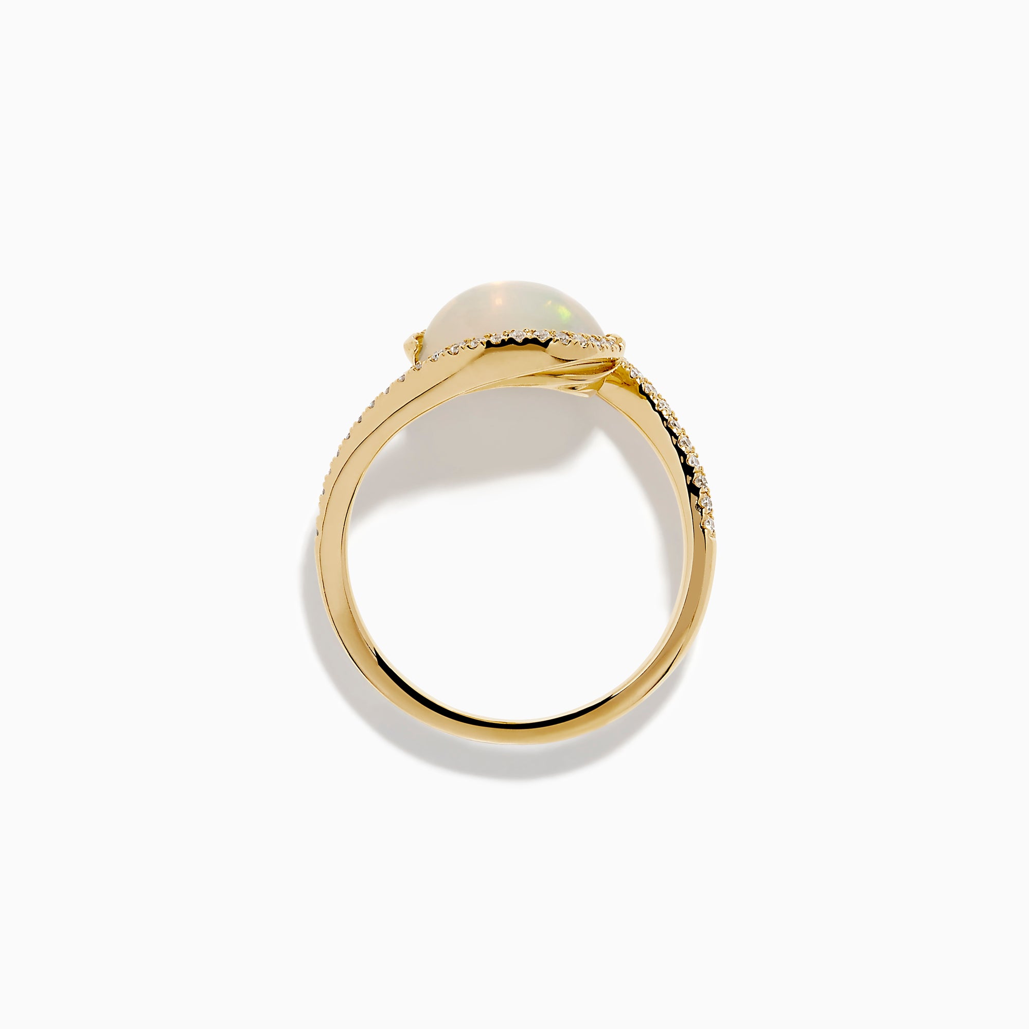 The 14K Yellow Gold Ethiopian Opal and Diamond Swirl Ring showcases a striking Ethiopian opal set in yellow gold, complemented by a swirling band adorned with sparkling diamonds.