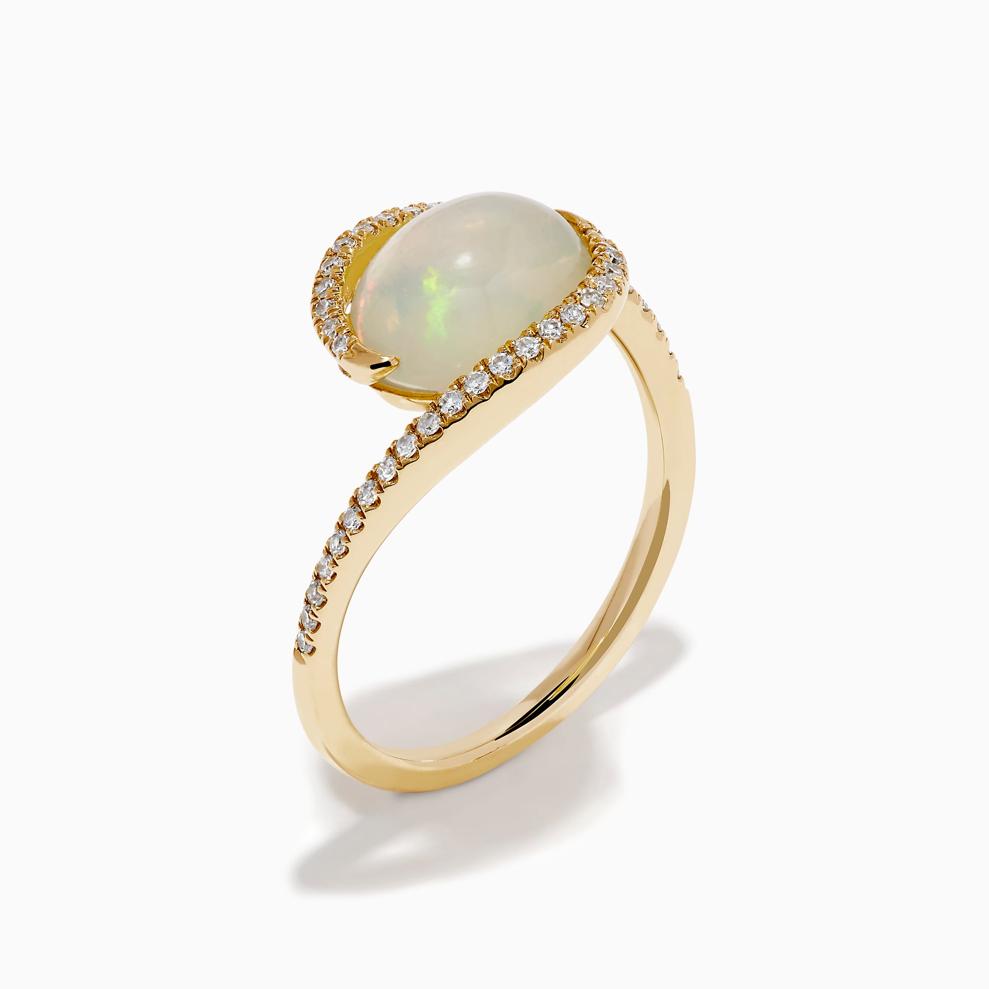 The 14K Yellow Gold Ethiopian Opal and Diamond Swirl Ring showcases a striking Ethiopian opal set in yellow gold, complemented by a swirling band adorned with sparkling diamonds.