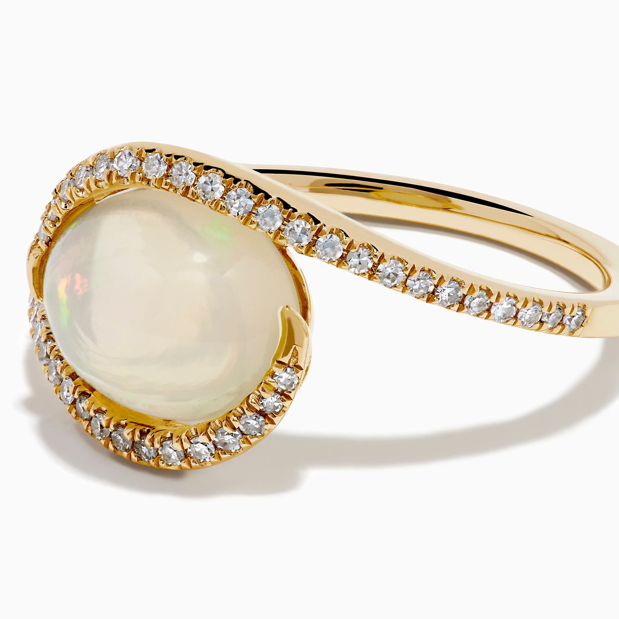 The 14K Yellow Gold Ethiopian Opal and Diamond Swirl Ring showcases a striking Ethiopian opal set in yellow gold, complemented by a swirling band adorned with sparkling diamonds.