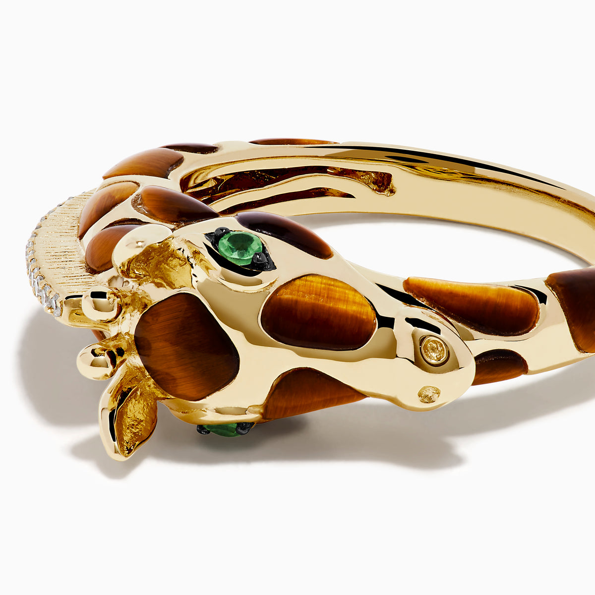 The 14K Yellow Gold Tiger's Eye and Diamond Giraffe Ring is designed to resemble a giraffe’s head and neck, featuring diamond accents and captivating tiger's eye gemstone details.