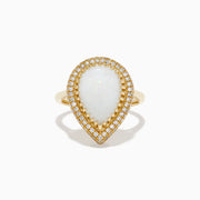 The 14K Yellow Gold Pear Shaped Opal and Diamond Cocktail Ring features a large pear-shaped opal framed by two rows of sparkling diamonds, displayed on a plain white background.