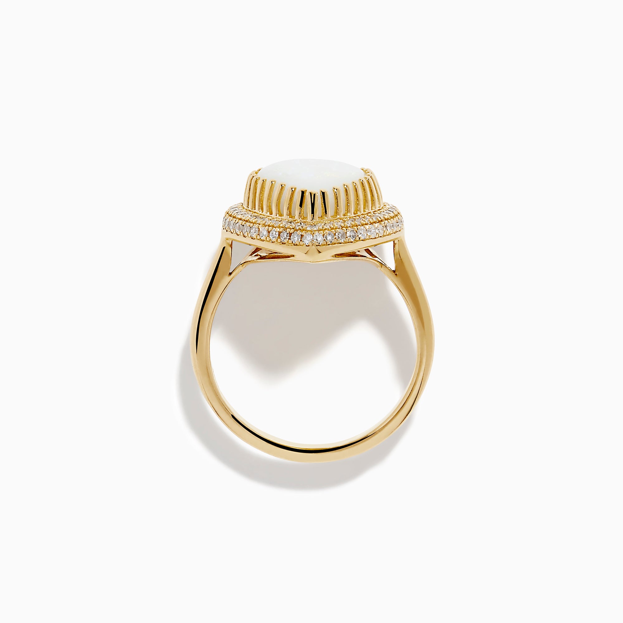 The 14K Yellow Gold Pear Shaped Opal and Diamond Cocktail Ring features a large pear-shaped opal framed by two rows of sparkling diamonds, displayed on a plain white background.