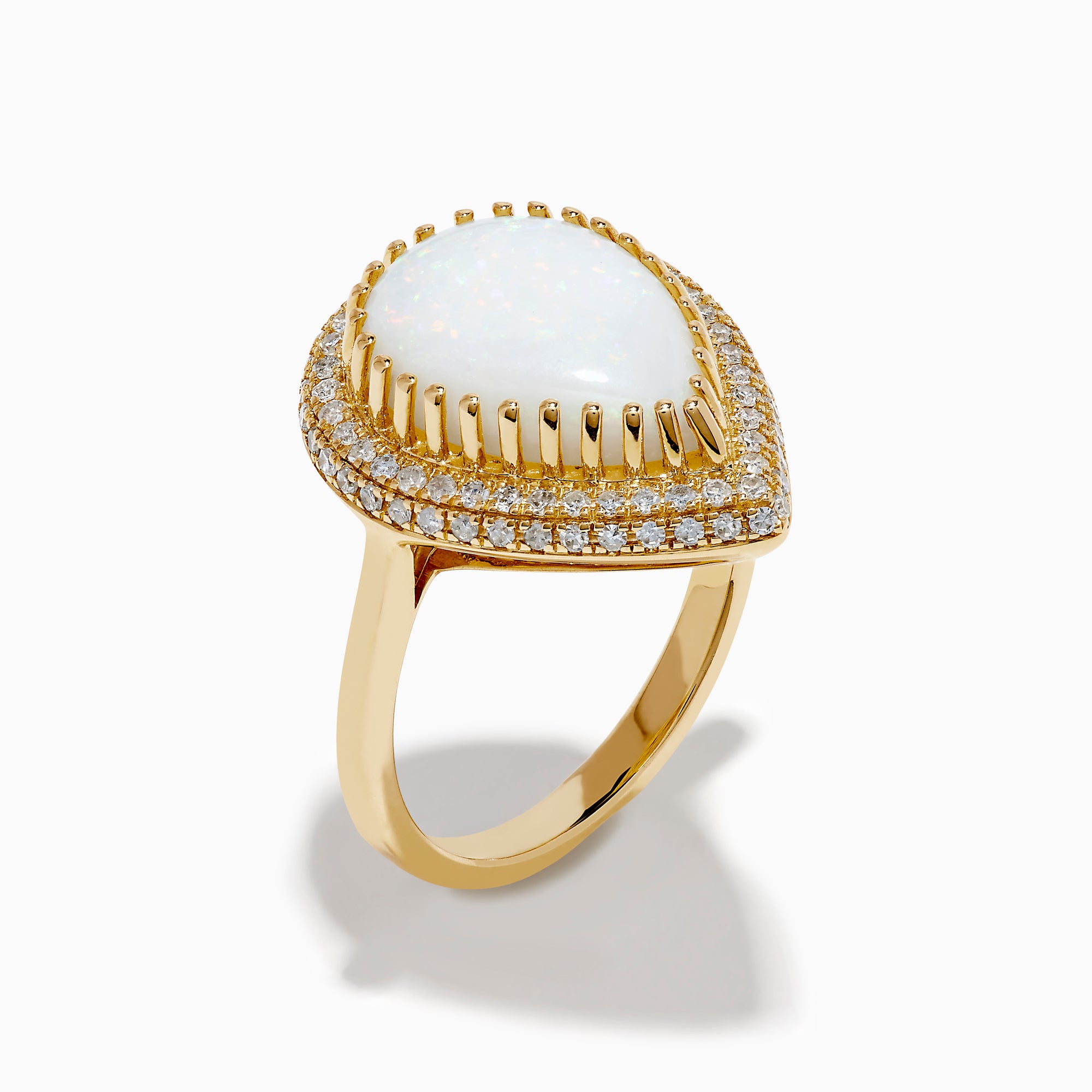 The 14K Yellow Gold Pear Shaped Opal and Diamond Cocktail Ring features a large pear-shaped opal framed by two rows of sparkling diamonds, displayed on a plain white background.