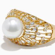 The 14K Yellow Gold Freshwater Pearl and Diamond Sunburst Ring features a central round freshwater pearl, accented by a halo of baguette-cut diamonds in a radiant sunburst design.