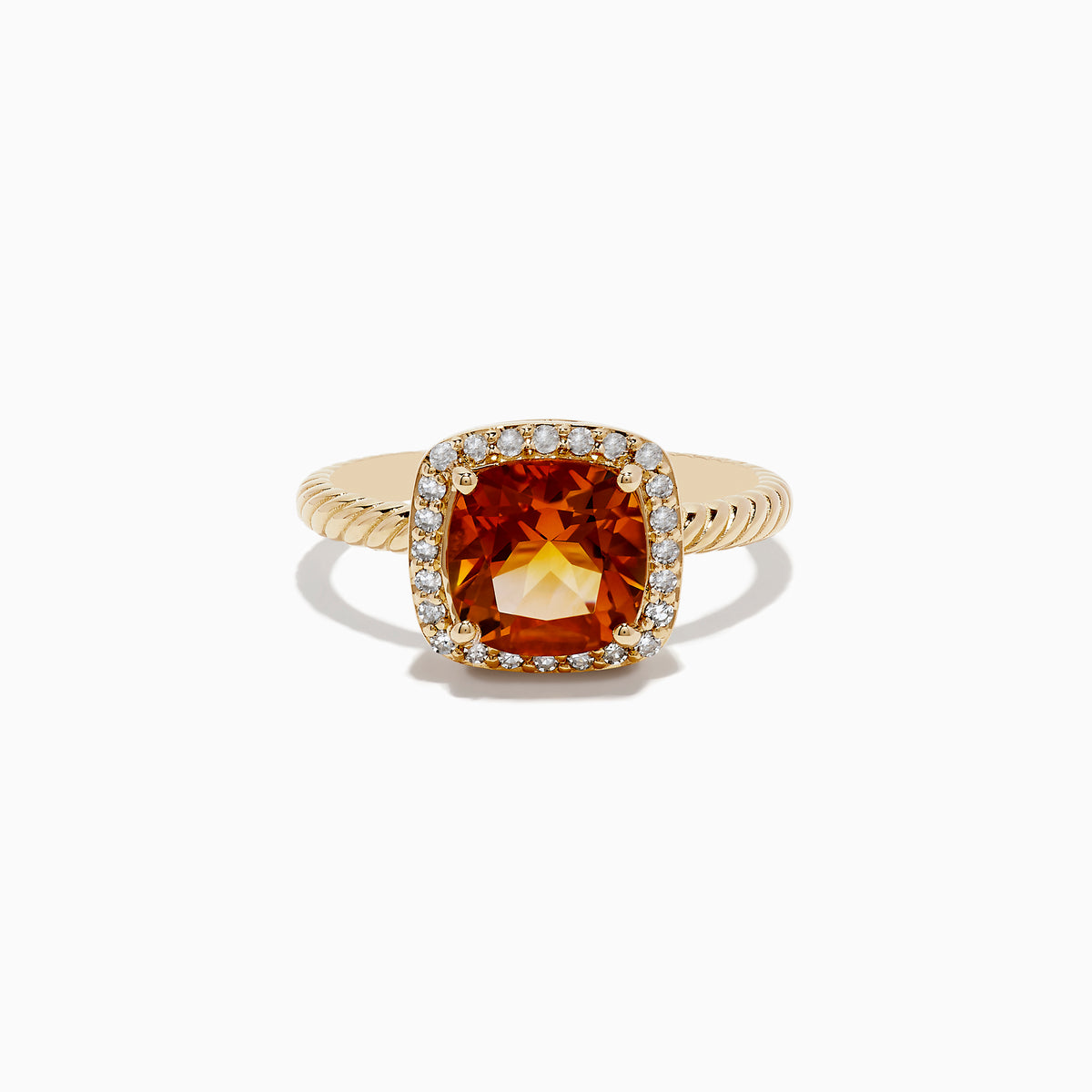 The 14K Yellow Gold Citrine and Diamond Ring showcases a cushion-cut orange citrine at the center, encircled by a halo of diamonds on a textured yellow gold band, elegantly displayed against a white background.