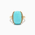 The 14K Yellow Gold Cabochon Turquoise and Diamond Ring showcases a large rectangular turquoise cabochon accented by two rows of sparkling white diamonds on each side, all set in polished yellow gold.