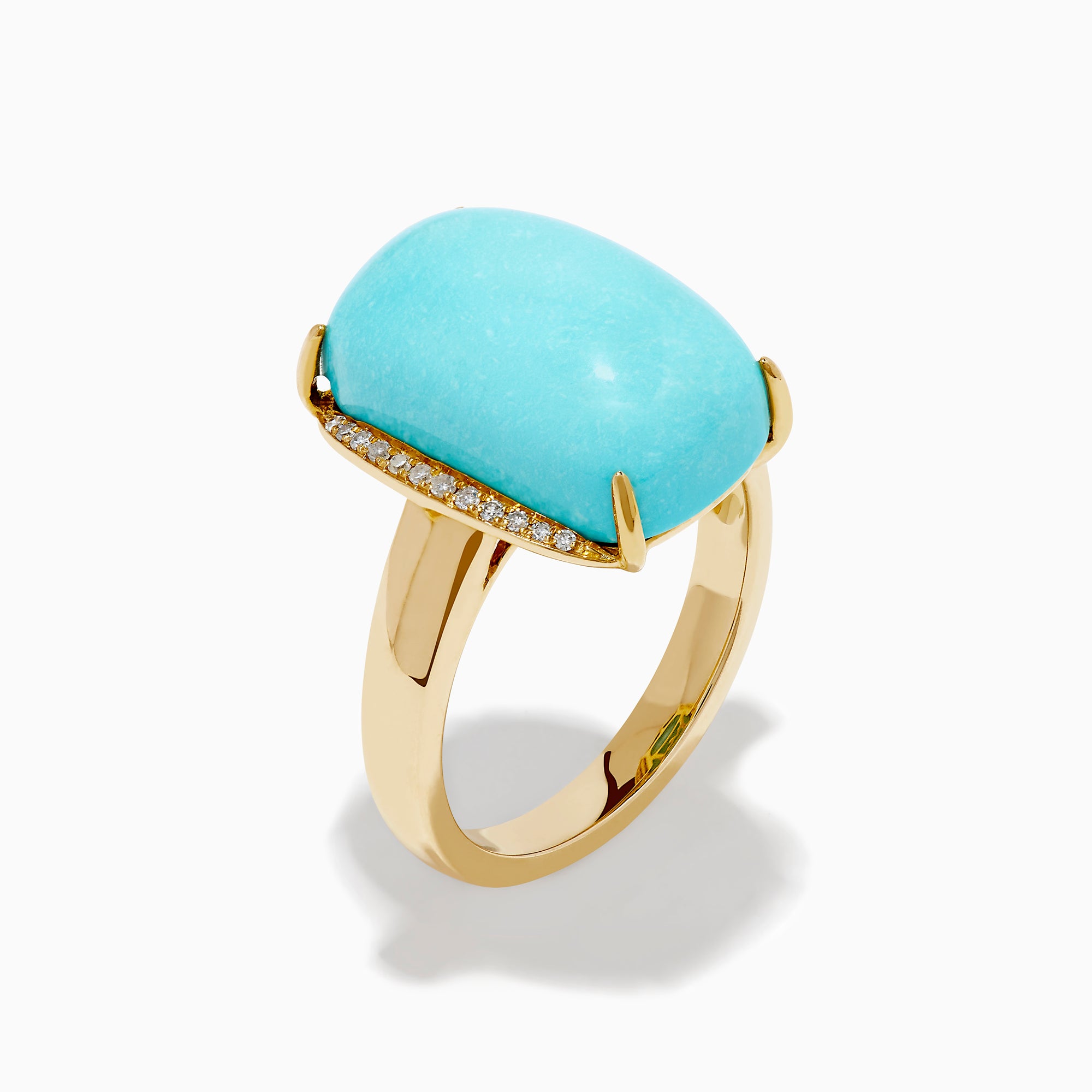 The 14K Yellow Gold Cabochon Turquoise and Diamond Ring showcases a large rectangular turquoise cabochon accented by two rows of sparkling white diamonds on each side, all set in polished yellow gold.