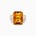 The Sunset 14K Yellow Gold Citrine and Diamond Cocktail Ring showcases a large rectangular citrine at the center, flanked by sparkling diamonds on both sides of the band, displayed on a white background.