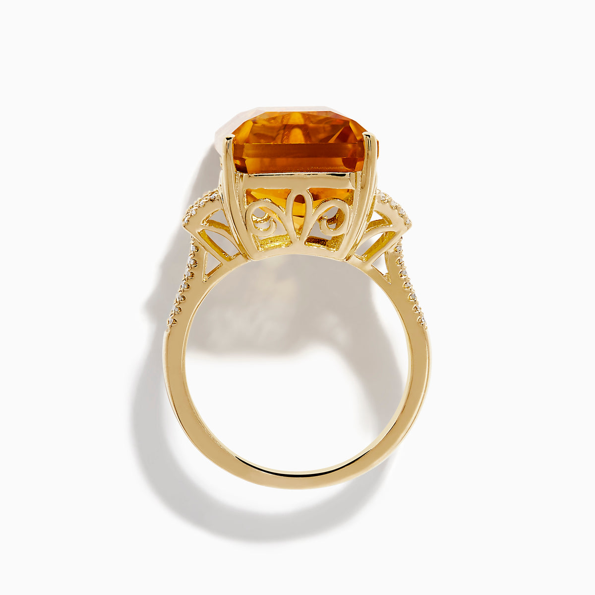 The Sunset 14K Yellow Gold Citrine and Diamond Cocktail Ring showcases a large rectangular citrine at the center, flanked by sparkling diamonds on both sides of the band, displayed on a white background.