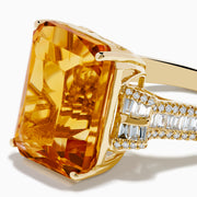 The Sunset 14K Yellow Gold Citrine and Diamond Cocktail Ring showcases a large rectangular citrine at the center, flanked by sparkling diamonds on both sides of the band, displayed on a white background.