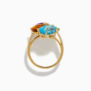 The 14K Yellow Gold Multi Color Gemstone and Diamond Cluster Ring features four large, pear-shaped blue, green, orange, and purple stones in a floral design with a diamond cluster accent on the band, shown on a white background.