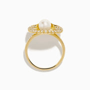 The 14K Yellow Gold Cultured Pearl and Diamond Shell Ring showcases a fan-shaped design with sparkling diamonds and a large white cultured pearl at the center, resembling an elegant diamond shell.