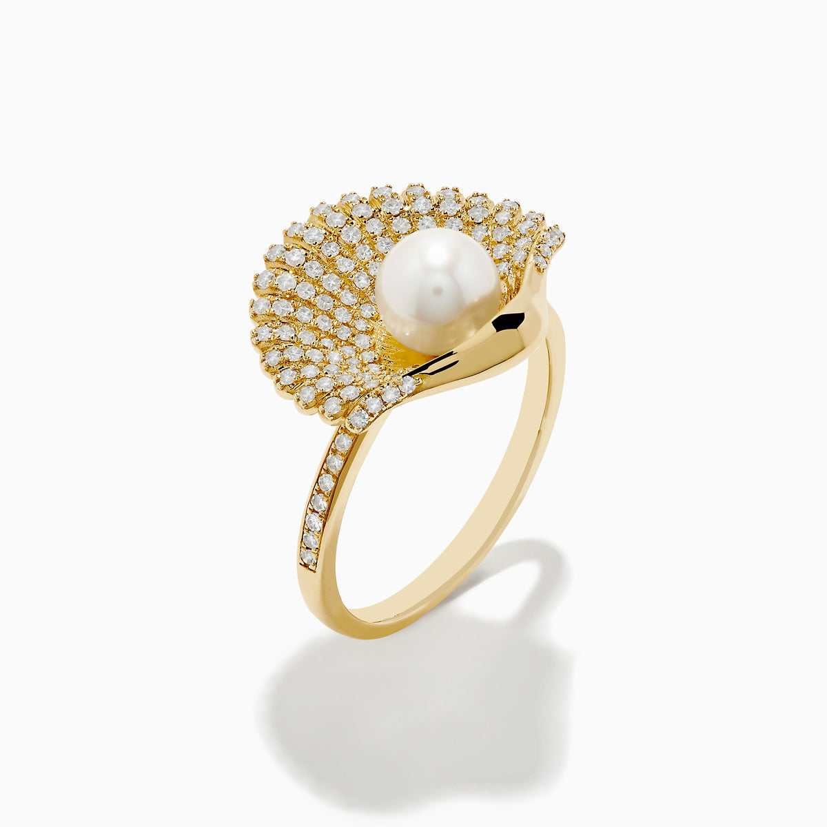 The 14K Yellow Gold Cultured Pearl and Diamond Shell Ring showcases a fan-shaped design with sparkling diamonds and a large white cultured pearl at the center, resembling an elegant diamond shell.