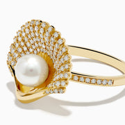 The 14K Yellow Gold Cultured Pearl and Diamond Shell Ring showcases a fan-shaped design with sparkling diamonds and a large white cultured pearl at the center, resembling an elegant diamond shell.