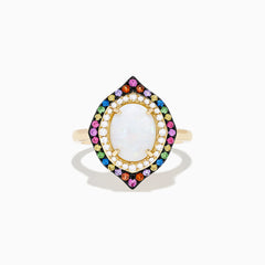 The 14K Yellow Gold Opal, Multi Gemstone and Diamond Ring showcases an oval opal center with dual halos of white diamonds and multicolored gems in a marquise-shaped design on a white background.