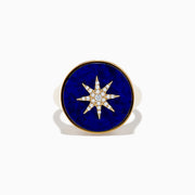 The 14K Yellow Gold Lapis and Diamond Compass Ring features a round deep blue lapis face accented with a central starburst of sparkling diamonds.