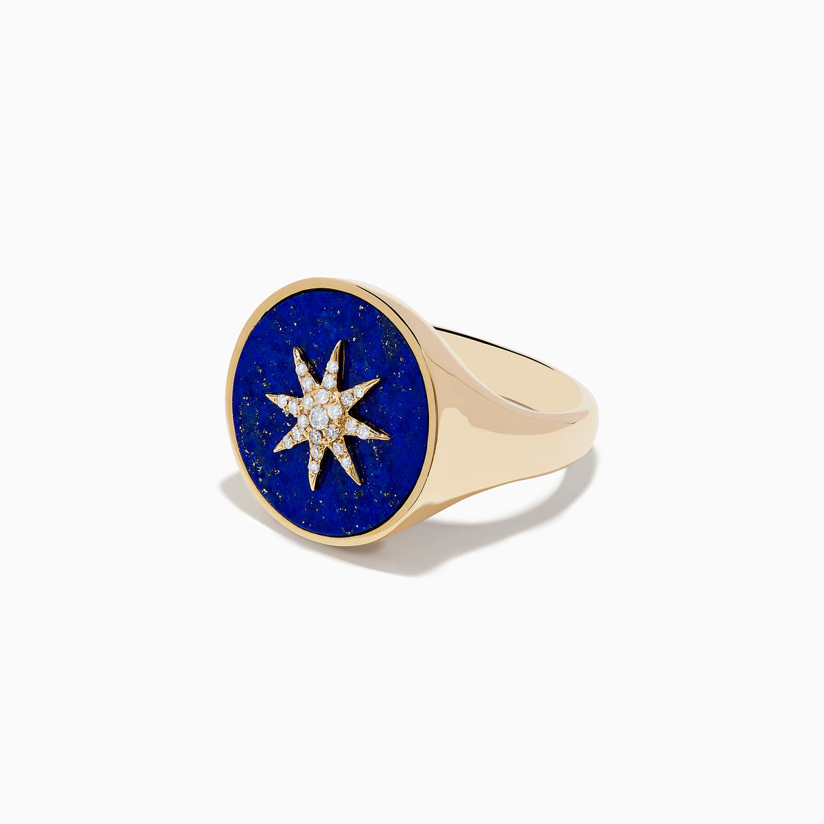 The 14K Yellow Gold Lapis and Diamond Compass Ring features a round deep blue lapis face accented with a central starburst of sparkling diamonds.