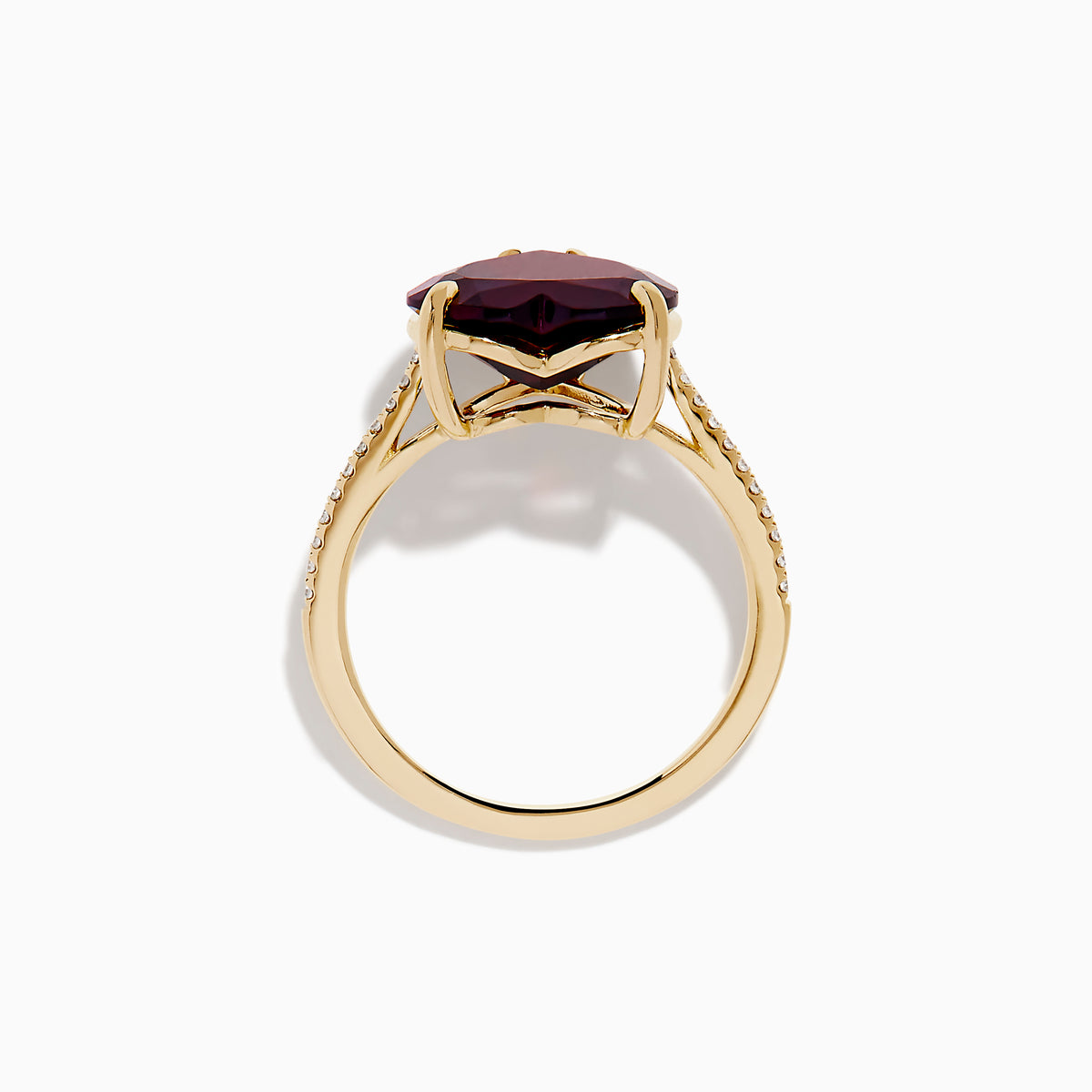 The Bordeaux 14K Yellow Gold Garnet and Diamond Heart Ring features a large heart-shaped deep red garnet at the center with small diamonds on the band, shown against a white background.