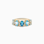 The 14K Yellow Gold London, Sky & Blue Topaz and Diamond Ombre Ring showcases alternating oval-cut blue topaz gemstones with diamonds set in a row along the band, displayed on a plain white background.